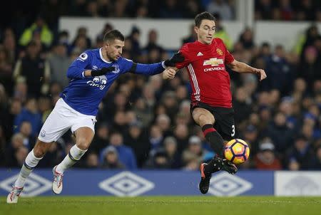 Football Soccer Britain - Everton v Manchester United - Premier League - Goodison Park - 4/12/16 Manchester United's Matteo Darmian in action with Everton's Kevin Mirallas Reuters / Andrew Yates Livepic