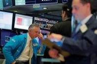 Traders work on the floor of the New York Stock Exchange (NYSE) in New York