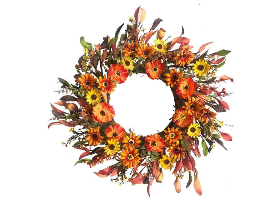 Welcome Autumn with orange daisies, wildflowers and autumn leaves.  (Source: Amazon)