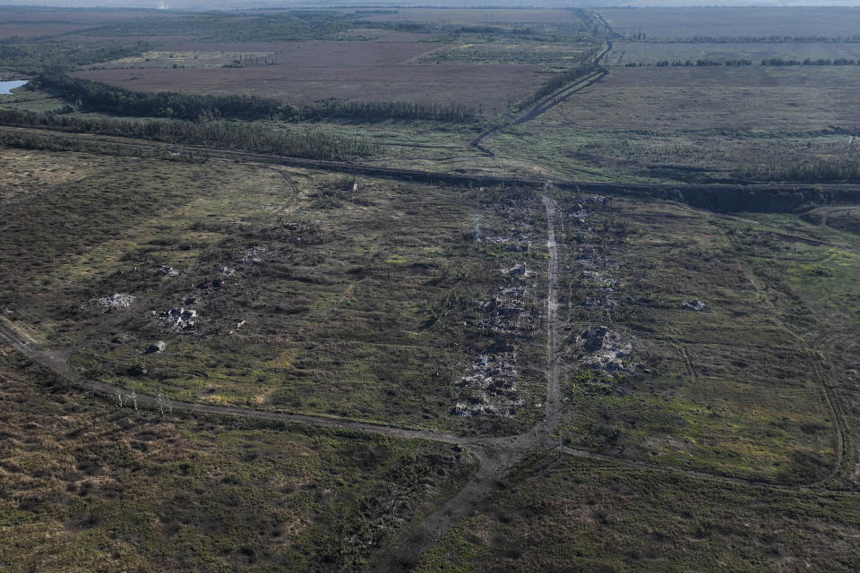 This drone image on Wednesday Sept. 6, 2023, shows houses seen destroyed during the fighting between Russian and Ukrainian armed forces are seen in Andriivka, Donetsk region, Ukraine. Deputy Defense Minister Hanna Maliar said this morning Ukraine's General Staff officially confirmed that Ukrainian troops captured Andriivka, which is 10 km south of Bakhmut. (AP Photo/Evgeniy Maloletka)