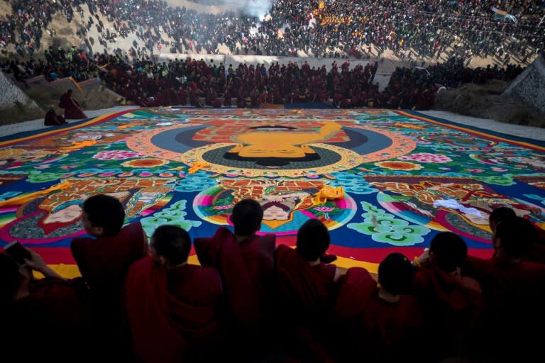 Tibetan Buddhist monks unveiled the huge thangka -- an image of Buddha painted on silk -- during the festivities