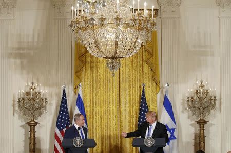 U.S. President Donald Trump (R) and Israeli Prime Minister Benjamin Netanyahu hold a joint news conference at the White House in Washington, U.S., February 15, 2017. REUTERS/Kevin Lamarque