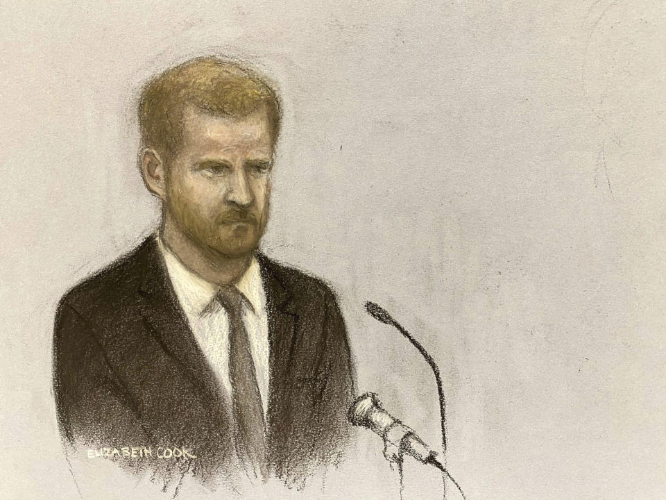 Court artist sketch by Elizabeth Cook Britain's Prince Harry gives evidence at the Rolls Buildings in central London, Tuesday, June 6, 2023 during the phone hacking trial against Mirror Group Newspapers (Elizabeth Cook/PA via AP)