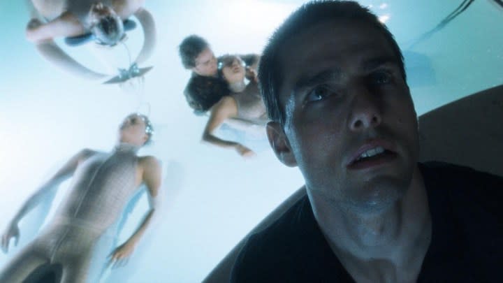 People float in a pool in Minority Report.