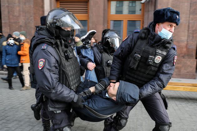 Russian police officers detain a man during an unsanctioned protest rally against the military invasion in Ukraine on March 6, 2022 in Moscow. (Photo: Epsilon via Getty Images)