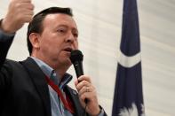 South Carolina Republican Party Chairman Drew McKissick gestures as he speaks to the Richland County GOP convention on Friday, April 30, 2021, in , S.C. (AP Photo/Meg Kinnard)