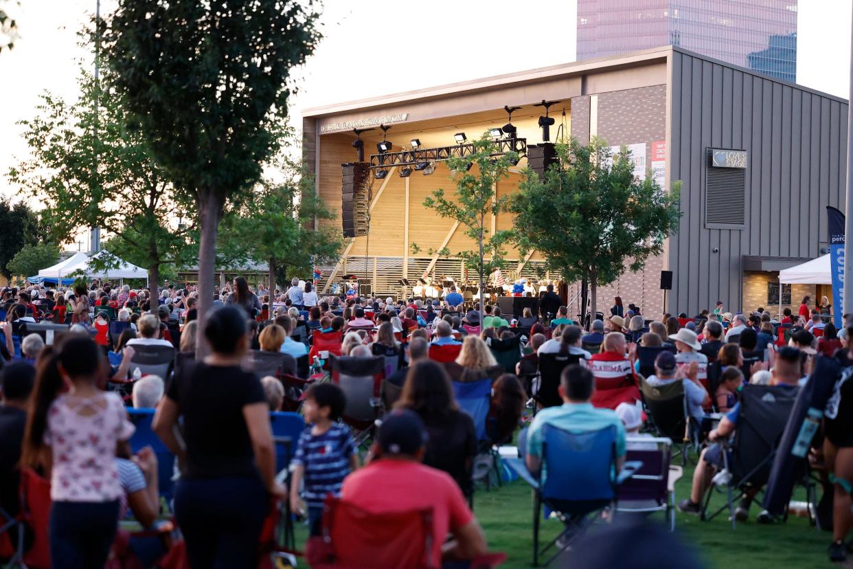 Fans listen to the Oklahoma City Philharmonic perform an outdoor concert during their annual Oklahoma City Philharmonic Red, White, and Boom at Scissortail Park in Downtown Oklahoma City on Monday, July 3, 2023.