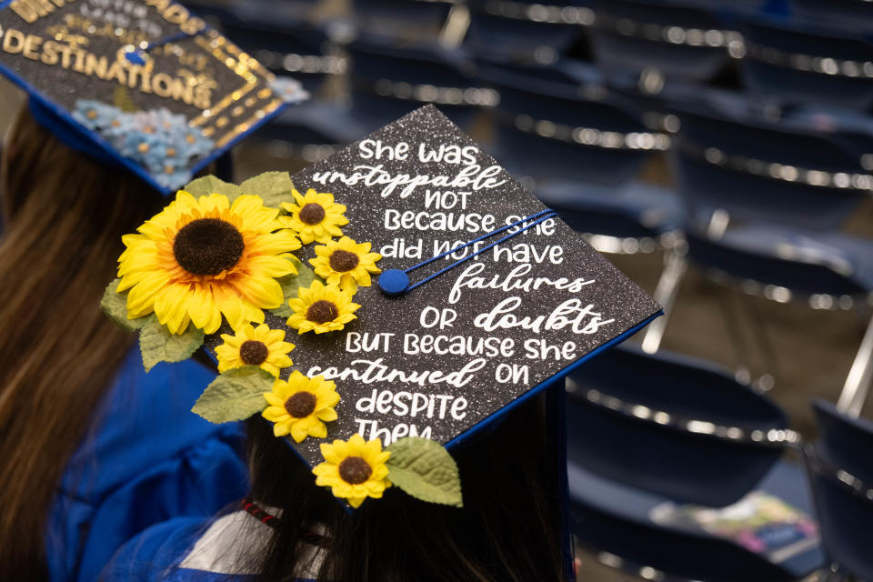 A graduate has a special message on her cap Friday evening at the Amarillo College Commencement Ceremony at the Amarillo Civic Center.