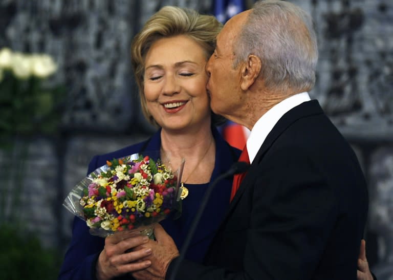 Israeli President Shimon Peres kisses US Secretary of State Hillary Clinton in 2009 in Jerusalem