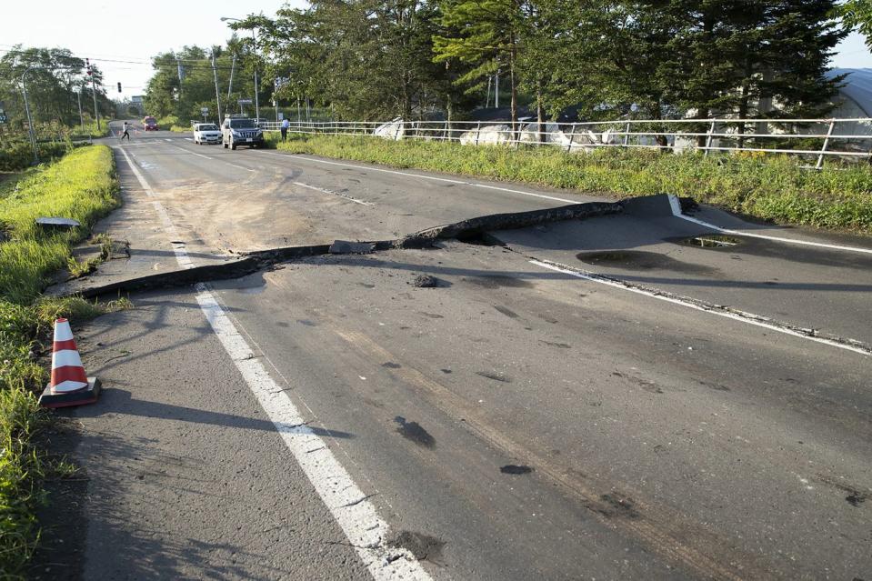 <p>A road damaged by the earthquake in Abira town.</p>