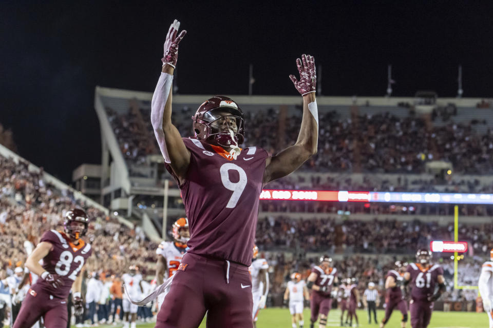 Virginia Tech's Da'Quan Felton celebrates a touchdown against Syracuse during the first half of an NCAA college football game Thursday, Oct. 26, 2023, in Blacksburg, Va. (AP Photo/Robert Simmons)