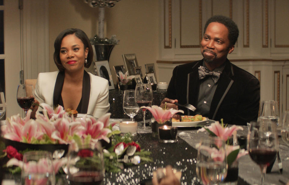 This image released by Universal Pictures shows Regina Hall, left, Harold Perrineau in a scene from "The Best Man Holiday." (AP Photo/Universal Pictures)