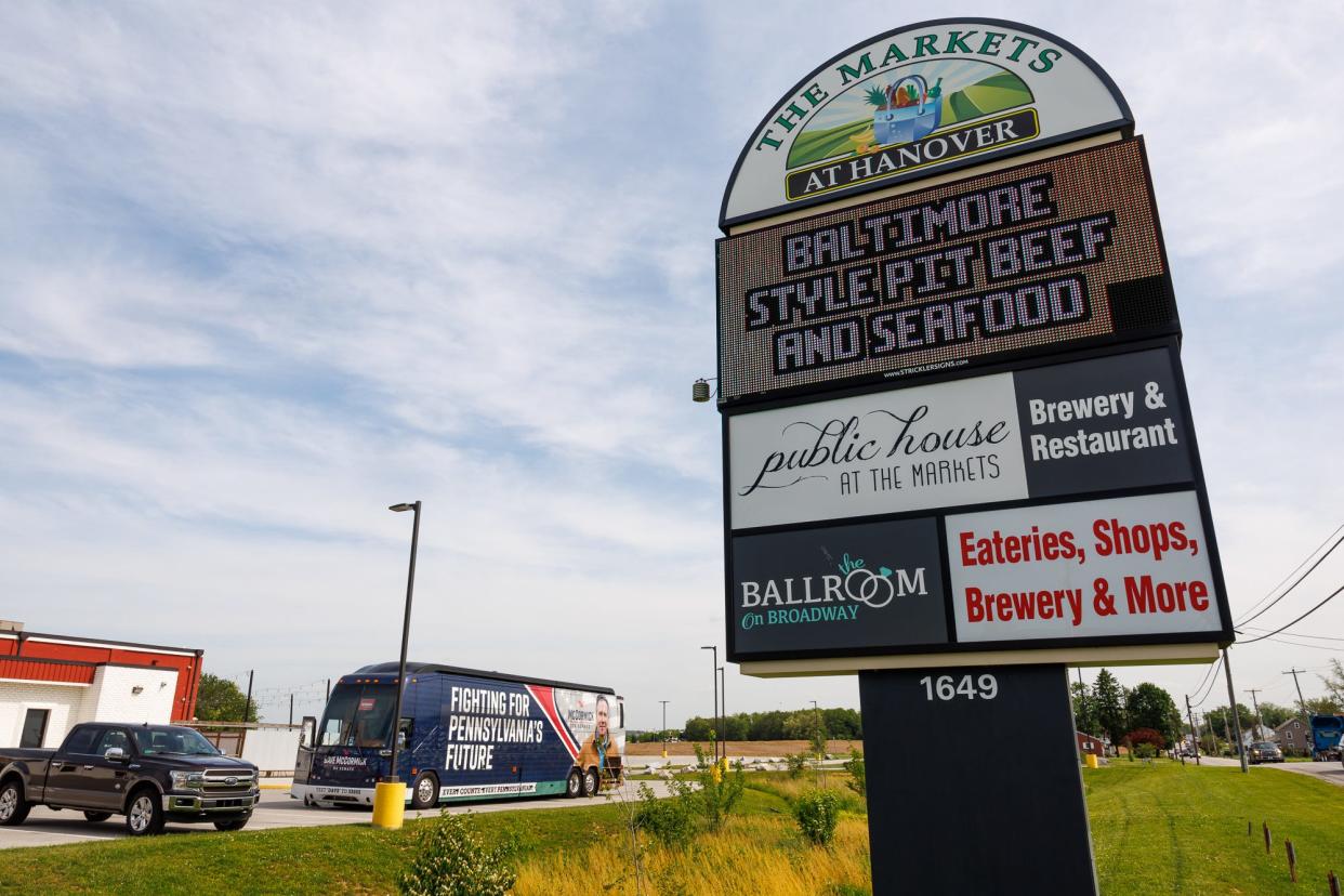 The campaign bus for Republican Senate candidate Dave McCormick is seen outside of the Markets at Hanover, Wednesday, May 8, 2024, in Penn Township.