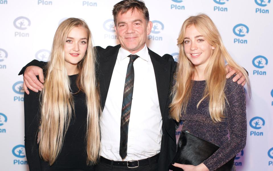 John Mitchie with his daughters Louella and Daisy - Alpha Press