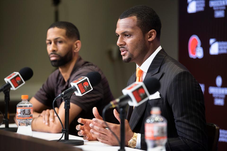Deshaun Watson, right, talks with the news media as general manager Andrew Berry listens on Friday.