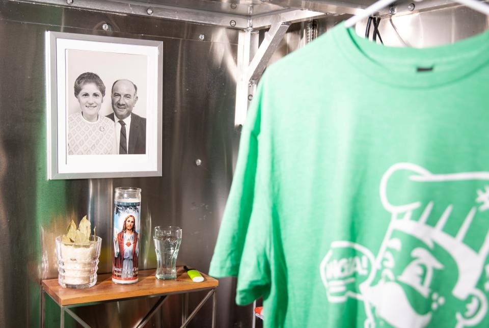 A photo of owner Mike Galatioto’s grandmother and grandfather Giovanna and Giuseppe hangs inside the food cart at New York Squares at the 45th Parallel Brewing, Friday, July 7, 2023, in Independence, Ore.