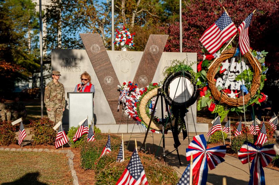 Shannon Stokes is awarded the Summit medal by Hope Mills Mayor, Jackie Warner as The Veterans of Foreign Wars Post 10630 present a Veterans Day Ceremony at Hope Mills Veterans Memorial Park on Monday, November 11, 2019.