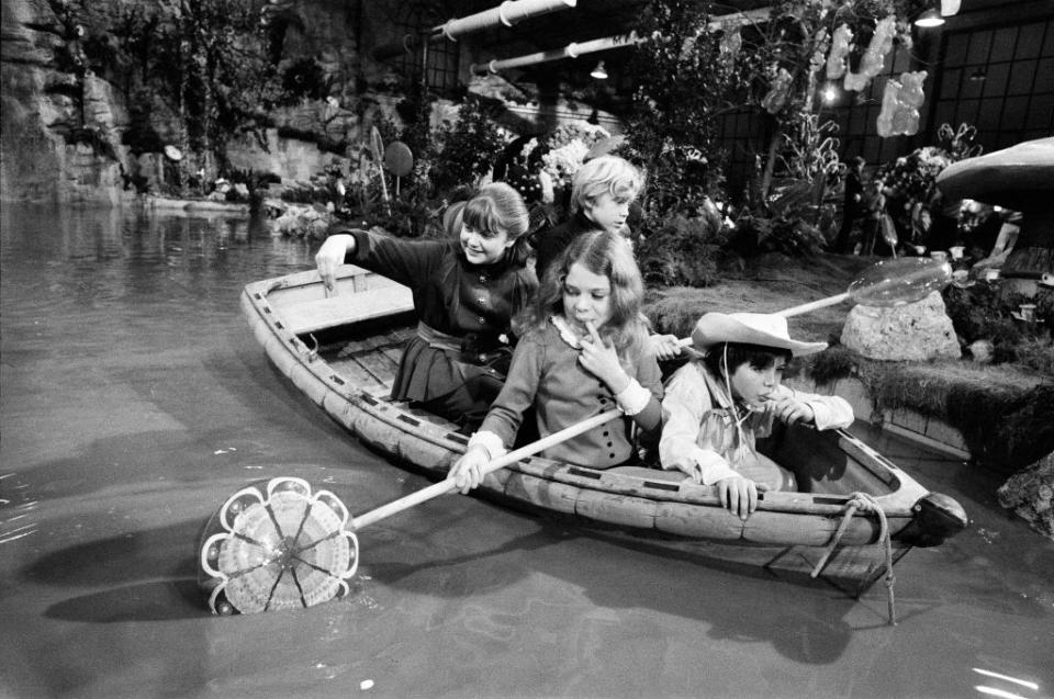 Denise Nickerson, in the dark dress, and co-stars filmed "Willy Wonka & the Chocolate Factory" on Oct. 8, 1970. (Photo: Arthur Sidey/Mirrorpix/Getty Images) 