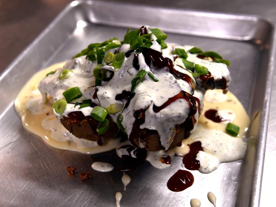 A Turkey Bacon Ranch Baked Potato at Texas Cowboy BBQ Friday.