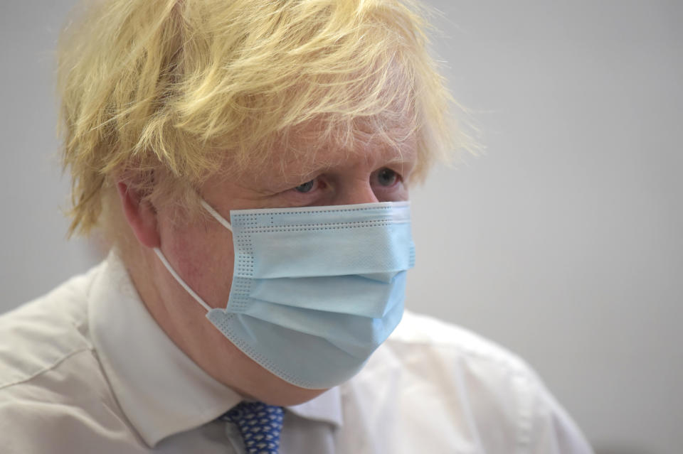 Prime Minister Boris Johnson during a visit to the Stow Health Vaccination centre in Westminster, central London. Picture date: Monday December 13, 2021.
