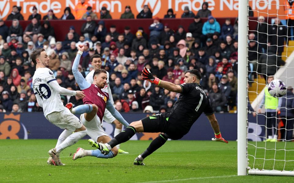 Tottenham Hotspur's James Maddison scores their first goal past Aston Villa's Emiliano Martinez