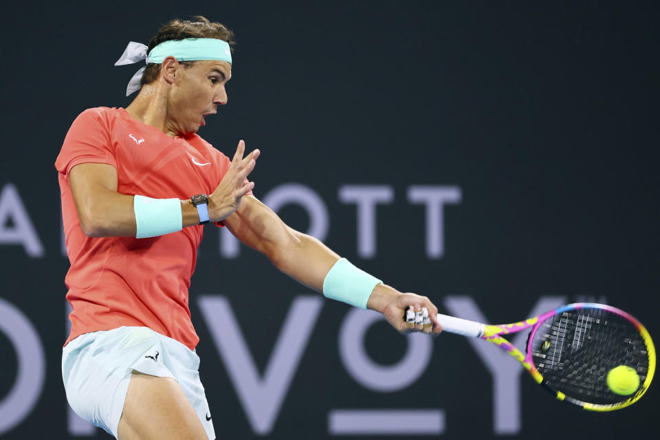 Rafael Nadal of Spain plays a shot in his match against Dominic Thiem of Austria during the Brisbane International tennis tournament in Brisbane, Australia, Tuesday, Jan. 2, 2024. (AP Photo/Tertius Pickard)