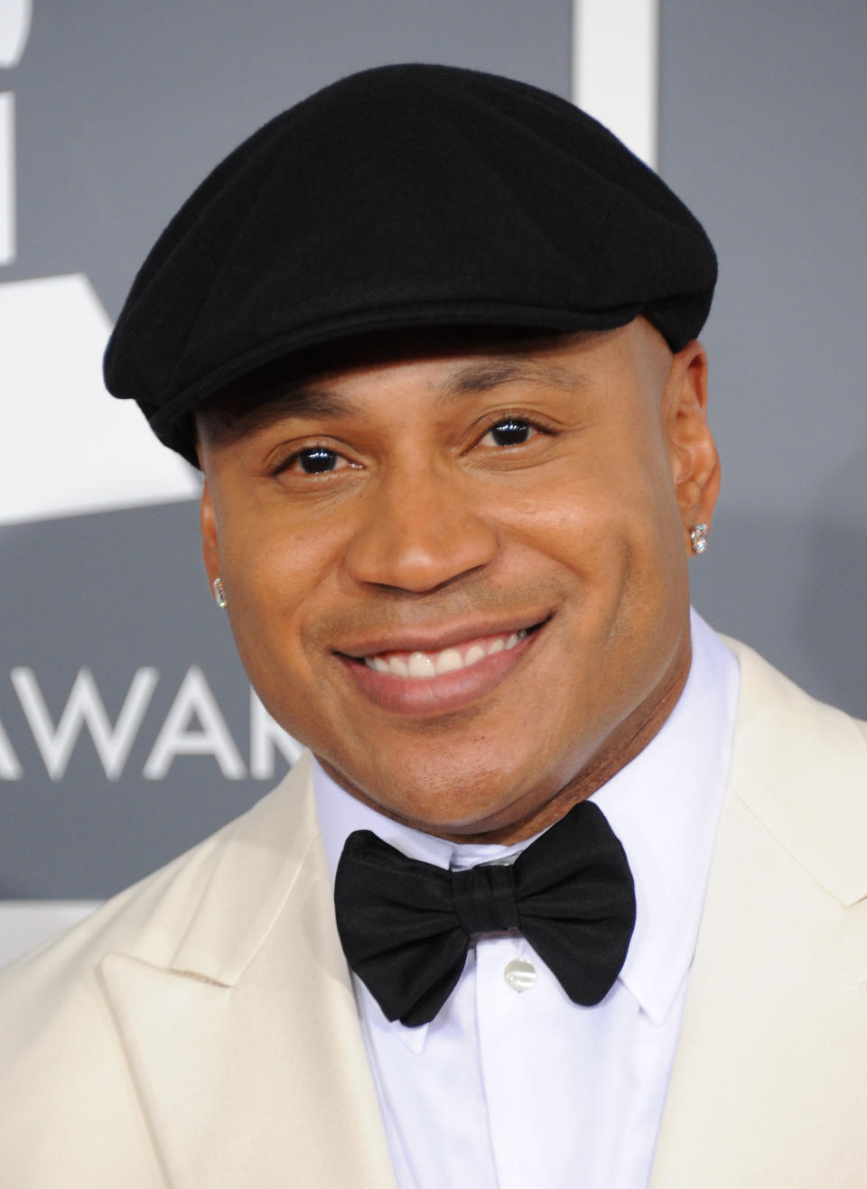 FILE - In this Feb. 10, 2013 file photo, LL Cool J arrives at the 55th annual Grammy Awards, in Los Angeles. The rapper was in trouble when he appeared on country singer Brad Paisley’s song “Accidental Racist.” The public deemed his raps shallow, as he rhymed lines like "If you don't judge my gold chains, I'll forget the iron chains," but the Grammy winner didn't lose any endorsements as a result. (Photo by Jordan Strauss/Invision/AP, File)