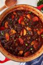 <p>Wine helps develop richer, more complex flavours in your stew. If you don't have any leftover cooking wine on hand, your stew will be delicious without it—just sub in more beef stock! </p><p>Get the <a href="https://www.delish.com/uk/cooking/recipes/a31127970/easy-beef-stew-recipe/" rel="nofollow noopener" target="_blank" data-ylk="slk:Classic Beef Stew;elm:context_link;itc:0;sec:content-canvas" class="link ">Classic Beef Stew</a> recipe.</p>