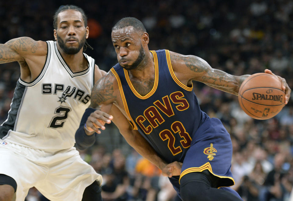 LeBron James and Kawhi Leonard could be teaming up in Los Angeles. (AP Photo/Darren Abate)