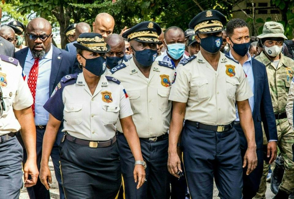 The new director general of the Haiti National Police of Haiti, Léon Charles, center, walks during a ceremony in Port-au-Prince, Haiti, on November 16, 2020.