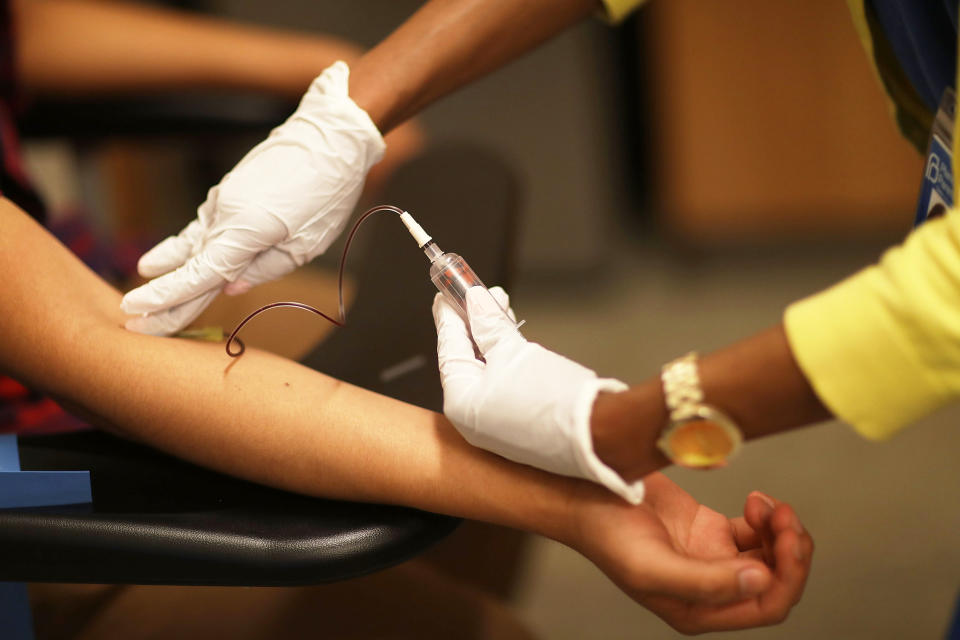 A person has their blood drawn at a Planned Parenthood health center (Joe Raedle / Getty Images file)