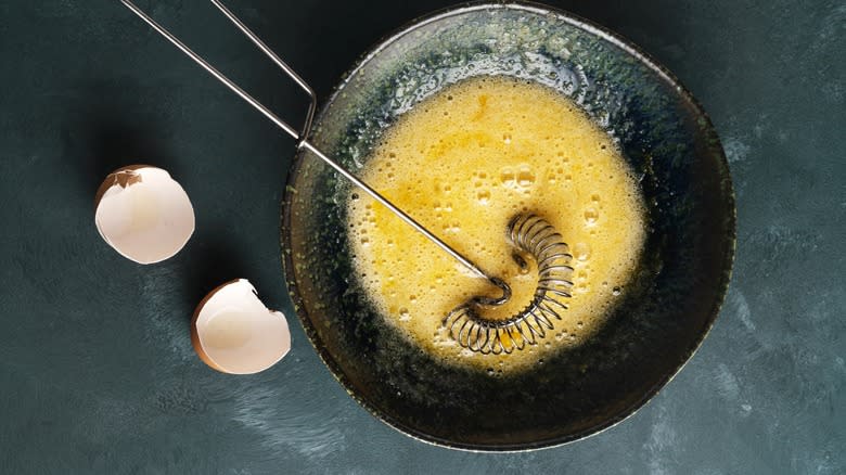 Beaten eggs with whisk