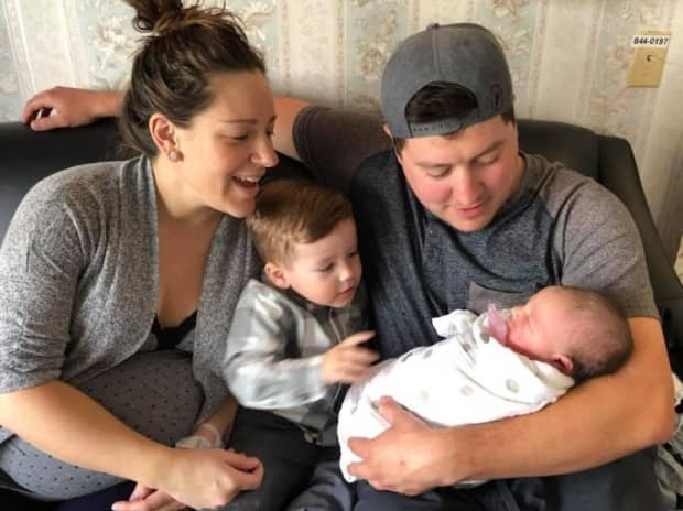 Aly Jenkins is pictured with her husband Scott, son Brady and daughter Avery. 