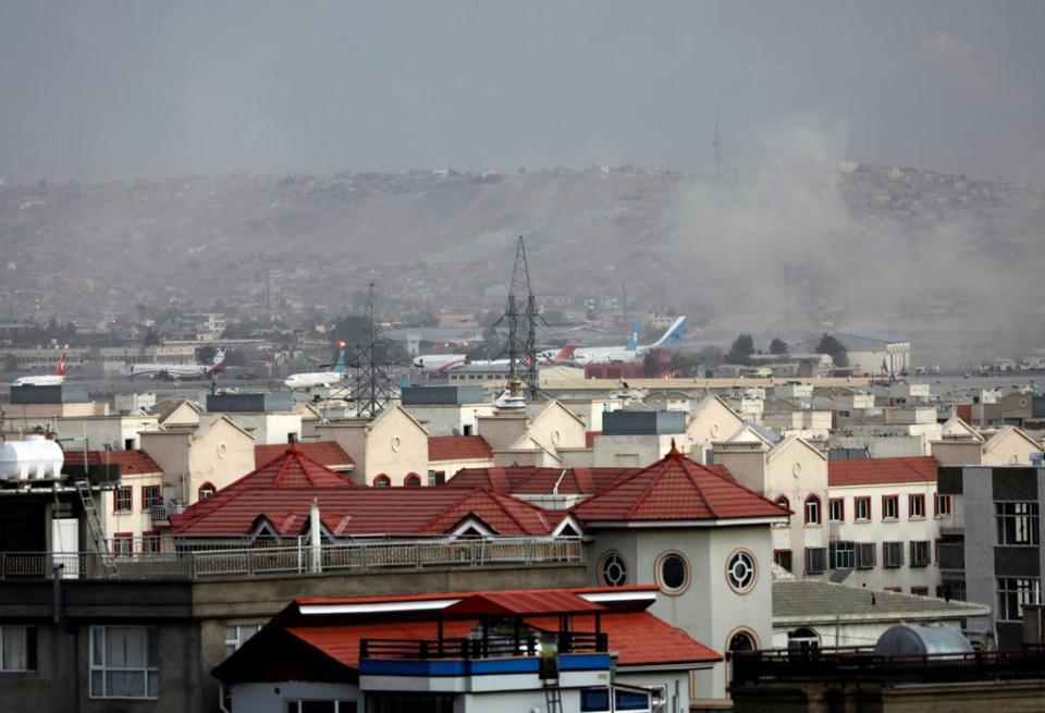 Smoke from the explosions at Kabul airport (Wali Sabawoon/AP) (AP)