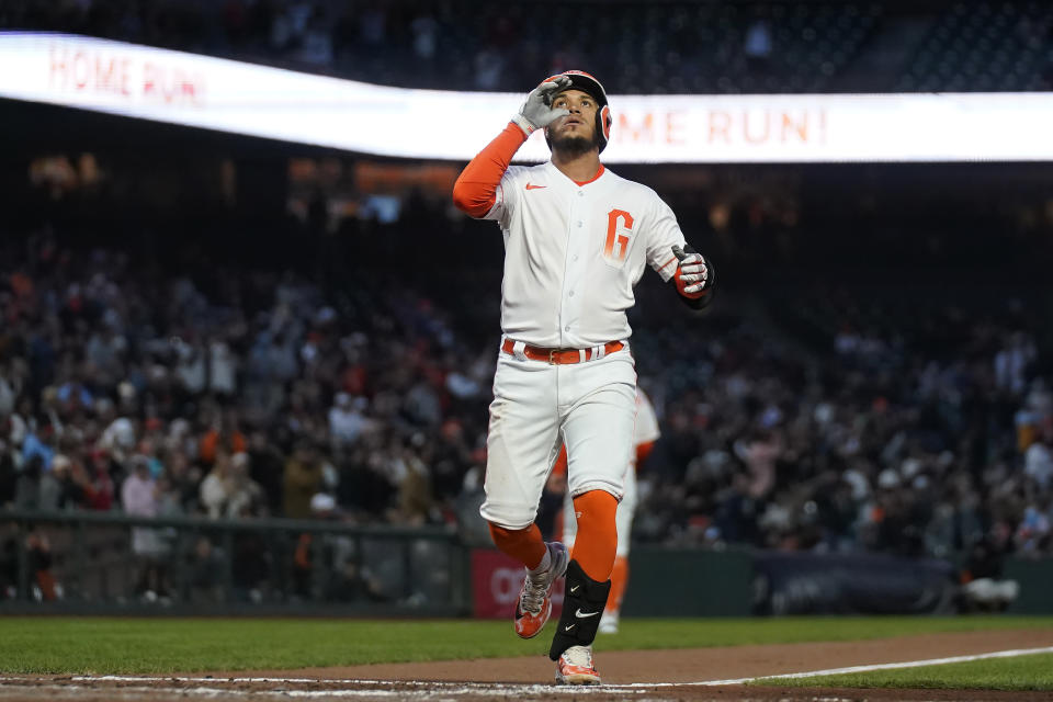San Francisco Giants' Thairo Estrada celebrates after hitting a home run against the Tampa Bay Rays during the sixth inning of a baseball game in San Francisco, Tuesday, Aug. 15, 2023. (AP Photo/Jeff Chiu)