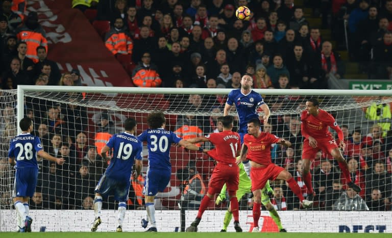 Chelsea's defender Gary Cahill (3R) jumps above Liverpool's defender Dejan Lovren (2R) as they vie for the ball during the English Premier League football match January 31, 2017