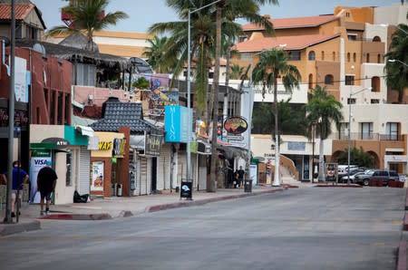 A general view shows shops and houses in Cabo San Lucas as Hurricane Lorena churns close to the southern tip of Mexico's Baja California