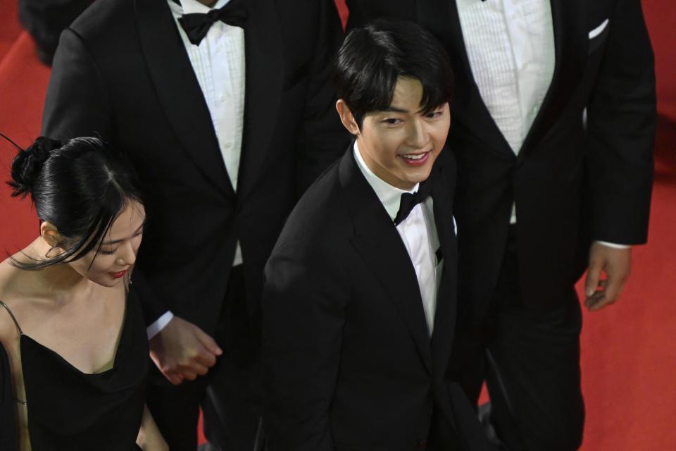 <p>(From L) South Korean singer and actress Kim Hyung-seo also known as Bibi and South Korean actor Song Joong-ki – who wore Louis Vuitton – arrived for the screening of the film Hwa-Ran (Hopeless) during the 76th edition of the Cannes Film Festival in Cannes, southern France, on May 24, 2023. (PHOTO: Patricia DE MELO MOREIRA / AFP) (Photo by PATRICIA DE MELO MOREIRA/AFP via Getty Images)</p> 