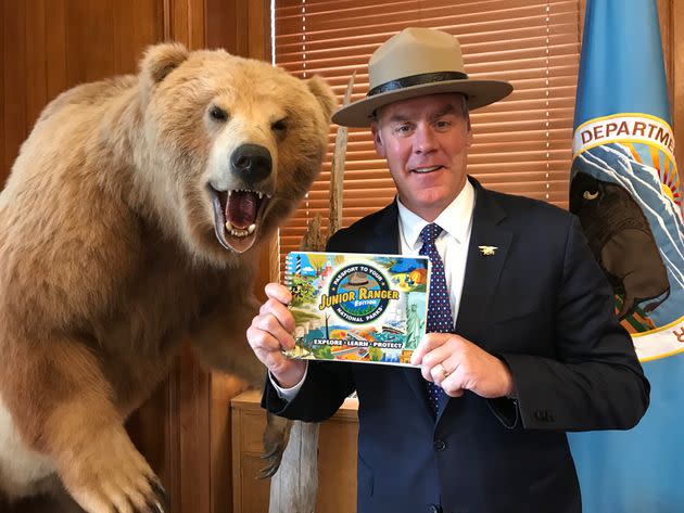 Then-Interior Secretary Ryan Zinke wore a National Park Service ranger hat backwards while promoting the NPS Junior Ranger program in 2018. 