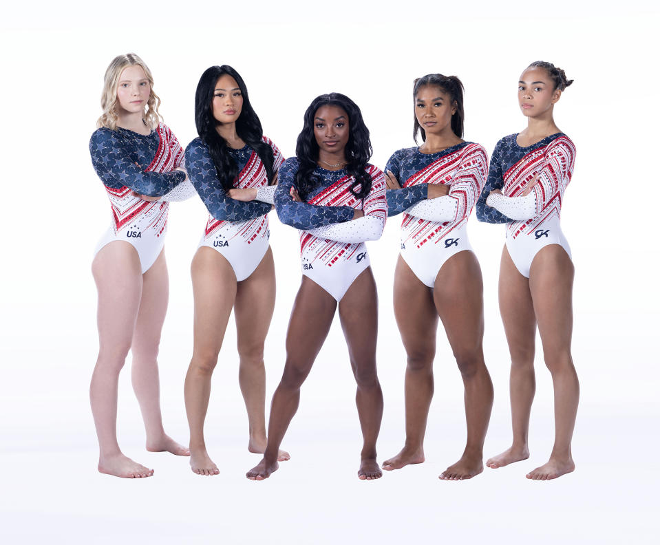 L to R: Jade Carey, Sunisa Lee, Simone Biles, Jordan Chiles and Hezly Rivera of Team USA model their uniforms for the 2024 Paris Olympics.
