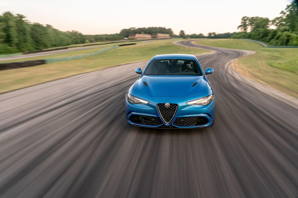<p>It was a wild ride of service lights and failure warnings for the <a href="https://www.caranddriver.com/alfa-romeo/giulia-quadrifoglio" rel="nofollow noopener" target="_blank" data-ylk="slk:Giulia Quadrifoglio;elm:context_link;itc:0;sec:content-canvas" class="link ">Giulia Quadrifoglio</a> at VIR this year. The rear differential overheated, but only after the "service electronic throttle control" light appeared, which had already wounded performance. Despite the mishaps, during its brief moments of high-speed reliability at each corner, this years <a href="https://www.caranddriver.com/features/a29390387/2018-alfa-romeo-giulia-quadrifoglio-lightning-lap/" rel="nofollow noopener" target="_blank" data-ylk="slk:Giulia beat its previous time in 2017 by 1.4 seconds;elm:context_link;itc:0;sec:content-canvas" class="link ">Giulia beat its previous time in 2017 by 1.4 seconds</a>. </p>