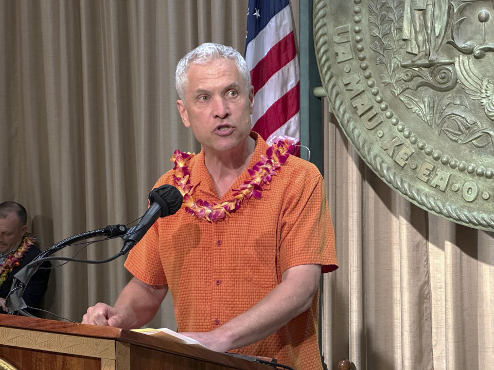 Hawaii state Rep. David Tarnas speaks before Gov. Josh Green signs gun control legislation in Honolulu on Friday, June 2, 2023. Green signed legislation that allows more people to carry concealed firearms but at the same time prohibit people from taking guns to a wide range of places, including beaches, hospitals, stadiums, bars that serve alcohol and movie theaters. (AP Photo/Audrey McAvoy)