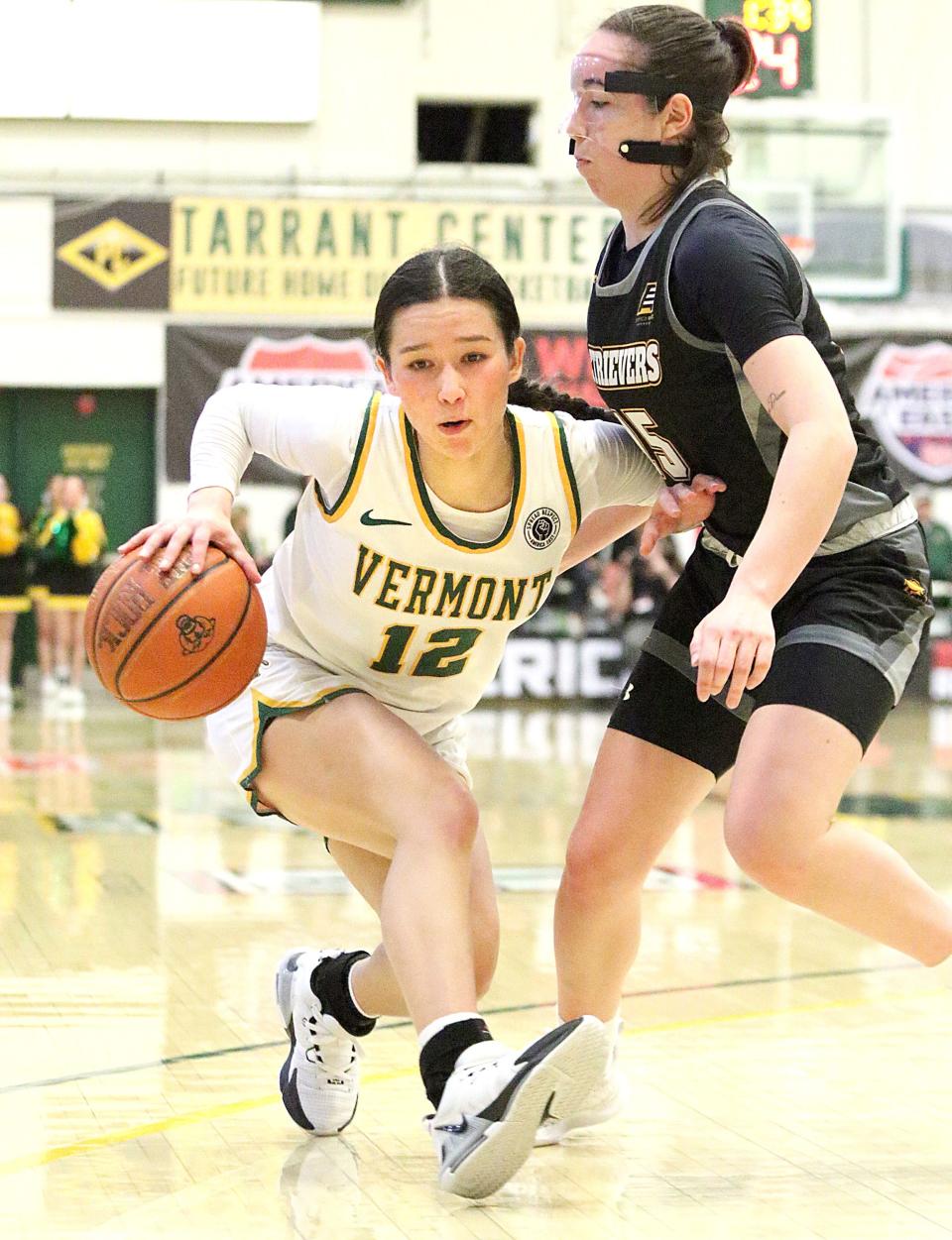 Vermont's Keira Hanson gets stopped on her way to the basket during the Catamounts 54-41 win over UMBC during the America East quarterfinals on Friday night at Patrick Gym.