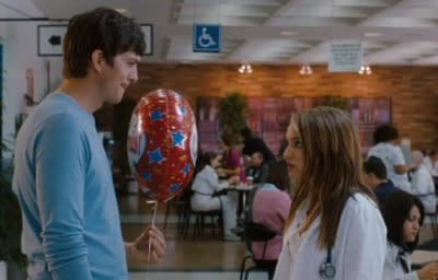 Ashton Kutcher and Natalie Portman battle out their romantic differences in a scene from 