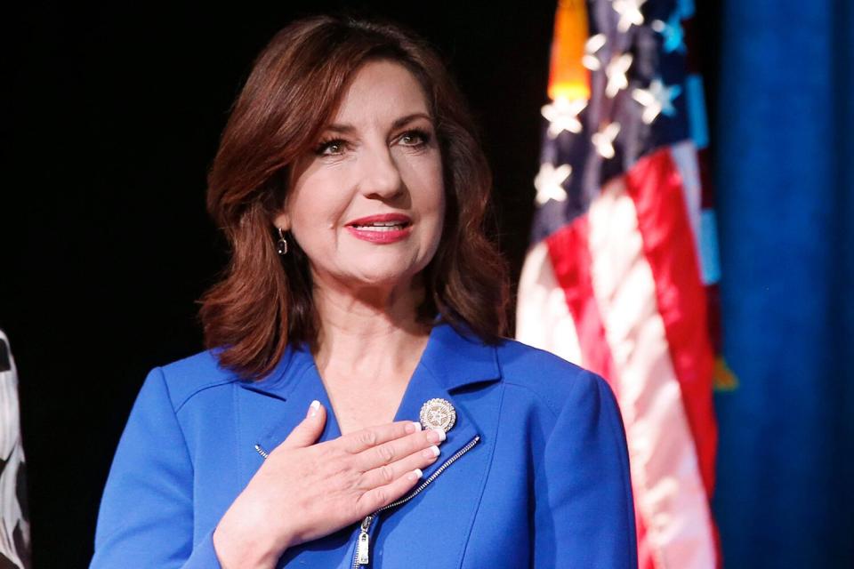 Joy Hofmeister, state superintendednt of schools, recites the Pledge of Allegiance at the Teacher of the Year ceremony in Oklahoma City Teacher of the Year Oklahoma, Oklahoma City, USA - 18 Sep 2018