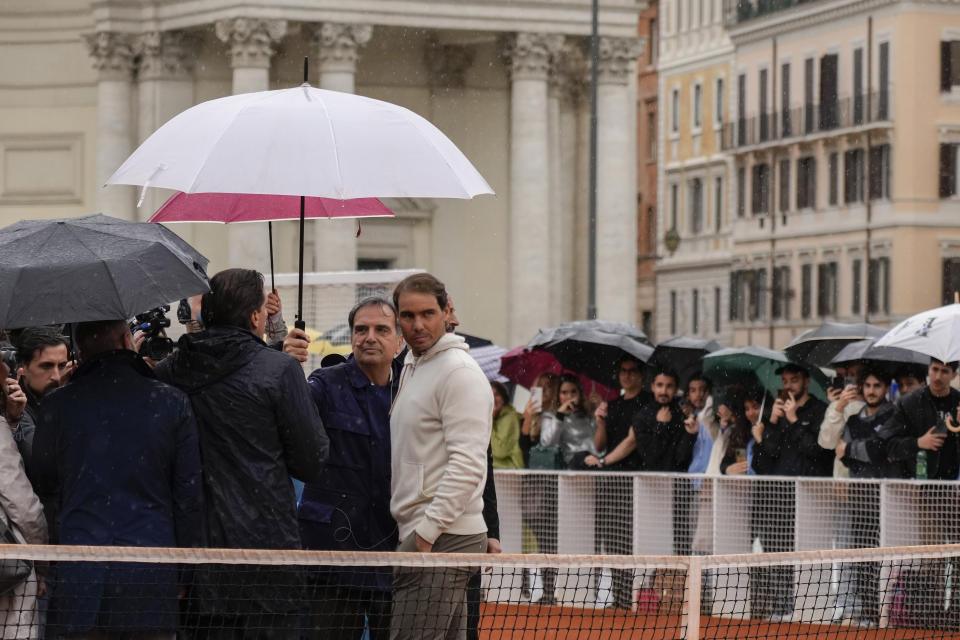 Rafael Nadal arrives for an event at Rome's Piazza Del Popolo, Wednesday, May 8, 2024. The 37-year-old Nadal, who has indicated that this will be his final year on tour, has played only nine matches this year after missing nearly all of 2023 due to a hip injury that required surgery. (AP Photo/Alessandra Tarantino)