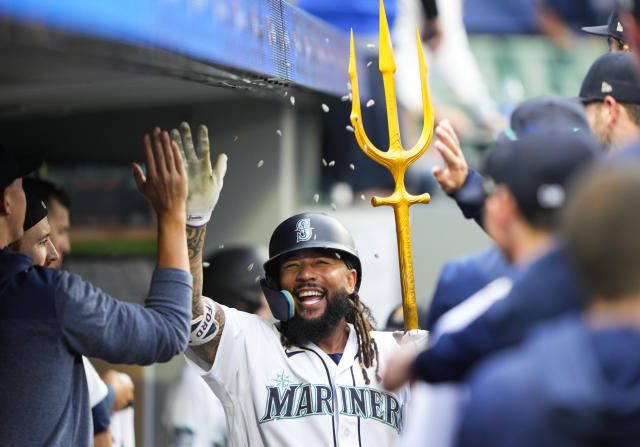 Official Seattle Mariners Julio Rodriguez celebrates with trident shirt