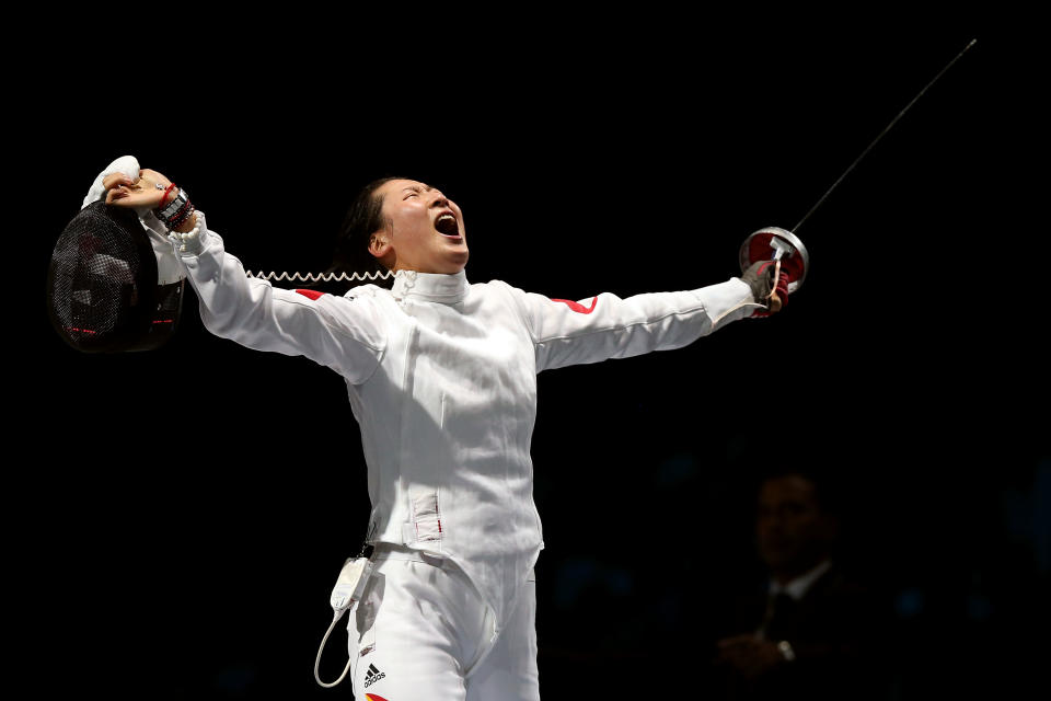 LONDON, ENGLAND - JULY 30: Yujie Sun of China celebrates after defeating A Lam Shin of Korea to win the Bronze Medal Bout in the Women's Epee Individual Fencing on Day 3 of the London 2012 Olympic Games at ExCeL on July 30, 2012 in London, England. (Photo by Ezra Shaw/Getty Images)