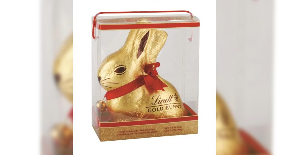 The Lindt chocolate gold bunny in a transparent box with the red bell around its neck.