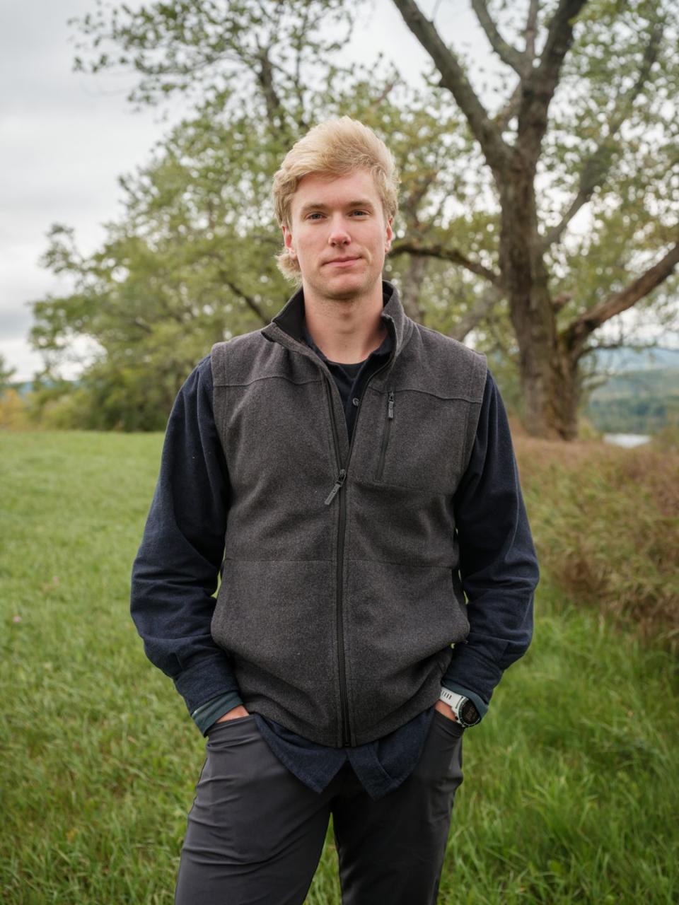 wilson family photographed on septemeber 23, 2022 in lyndonville, vt matthew wilson stands in a field used by kingdom trails in lyndonville, vt, near the apple tree his family planted in memory of moriah